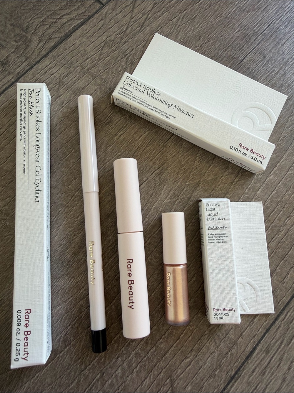 Rare Beauty perfect strokes Gel Eyeliner & volumizing mascara & luminizer se
